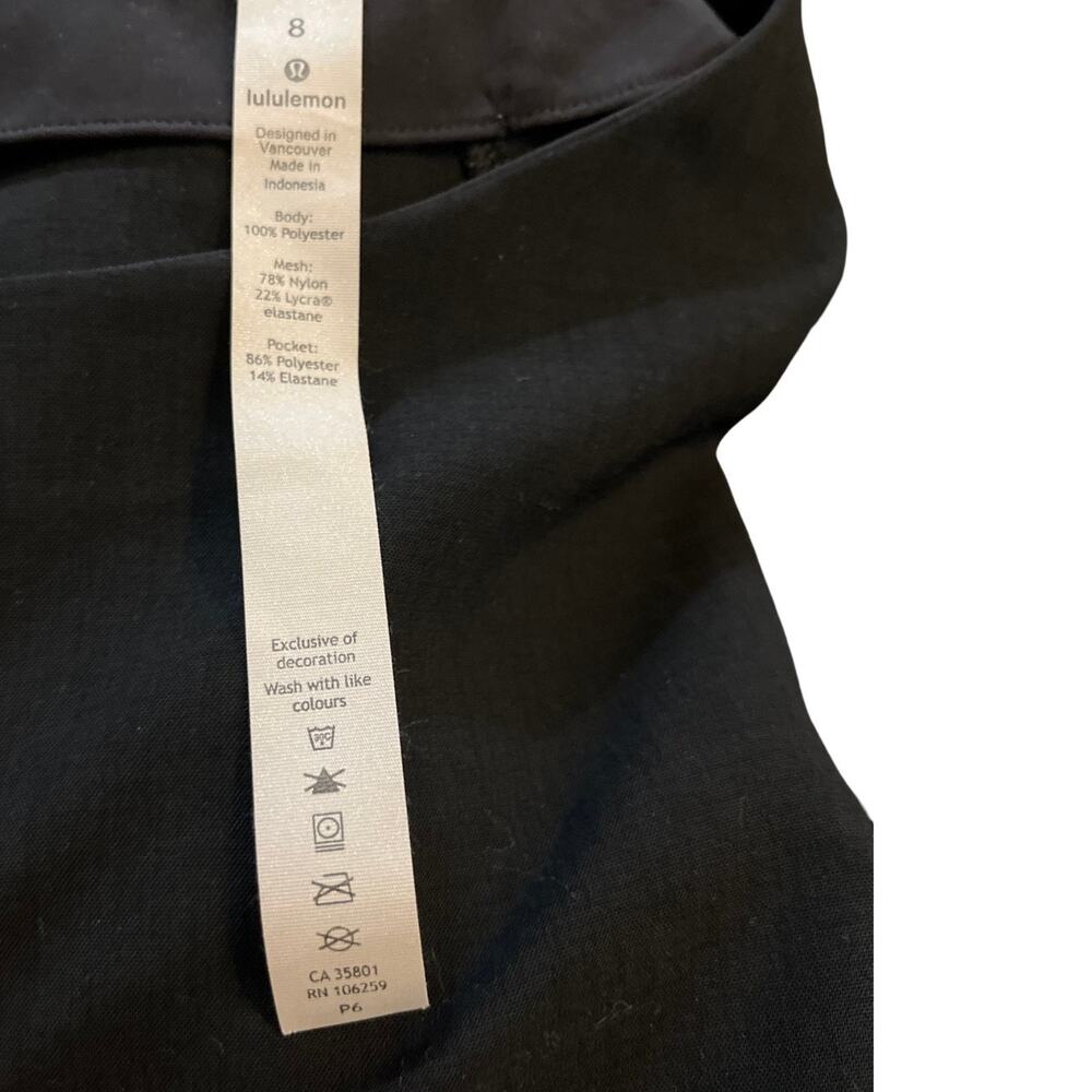 Lululemon A Shift In Time Black Short Sleeve Blouse Women's Size 8 Relaxed Fit - Picture 2 of 10